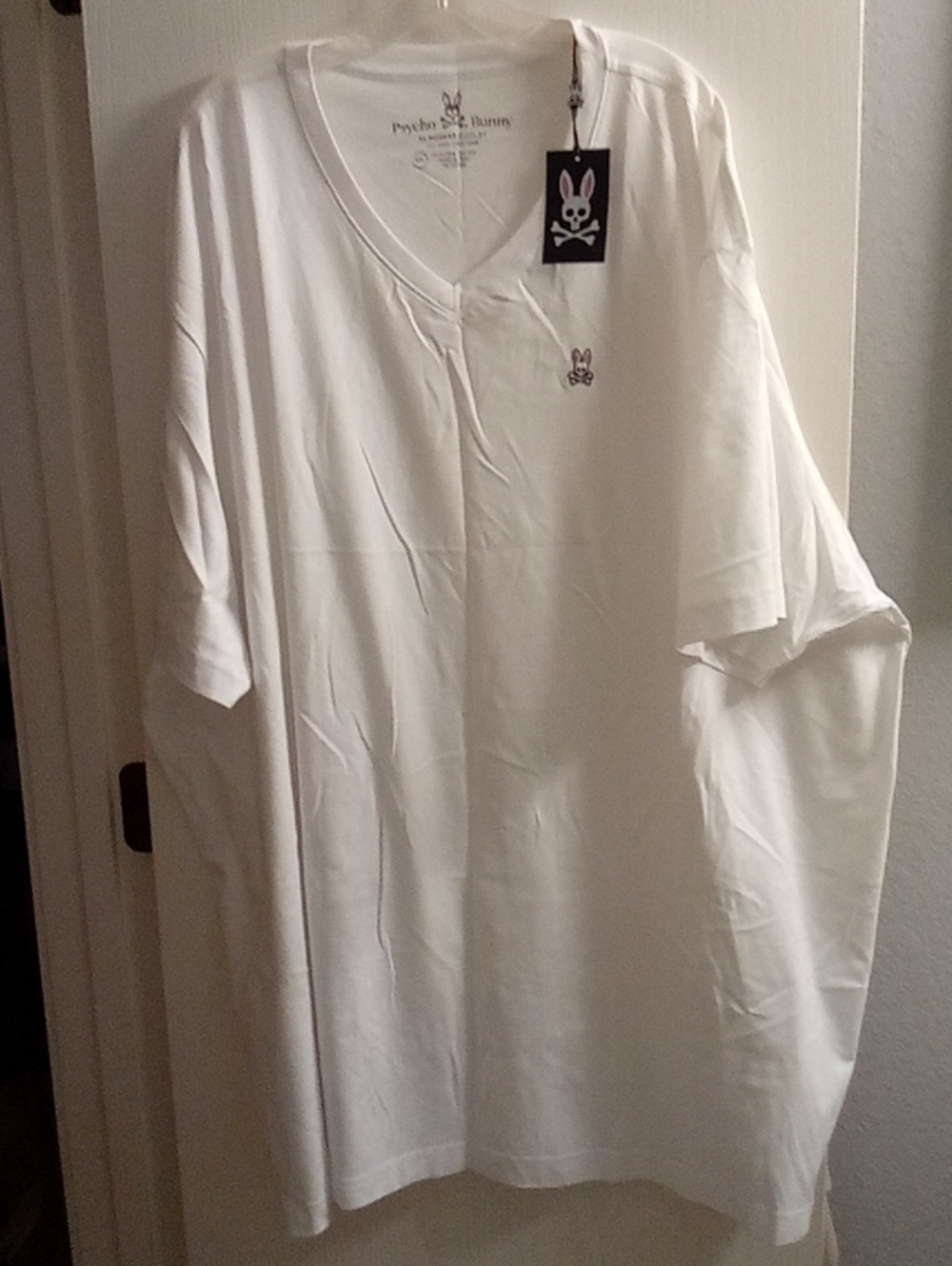 Psycho Bunny White V-Neck Short Sleeve Tee with Pink Logo